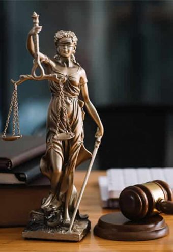 statue-of-lady-justice-on-desk-of-a-judge-or-lawye-SVECXT5-intro.jpg